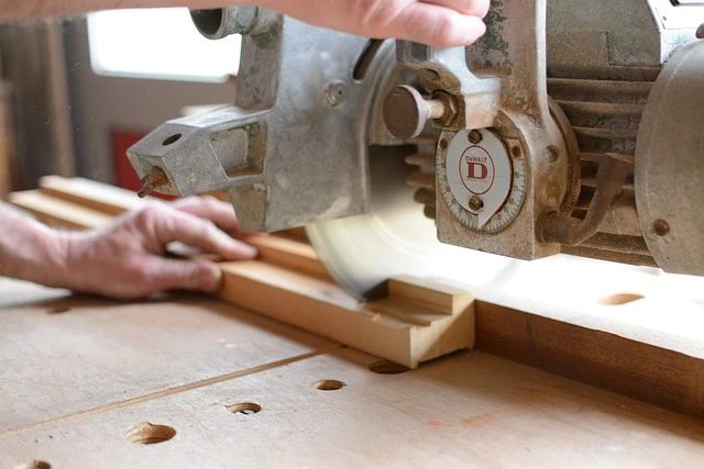 Carpentry business-carpenter working with saw