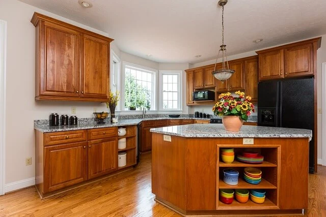 Natural wood kitchen cabinets