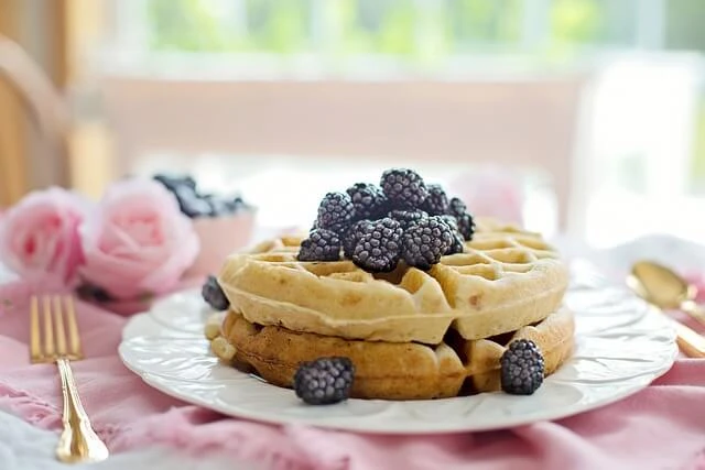 Cafe - waffles with blackberries on top