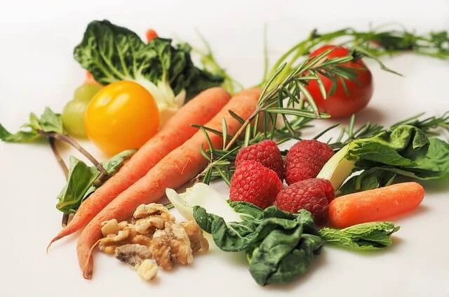 Health Food -carrots, tomatoes, nuts and berries