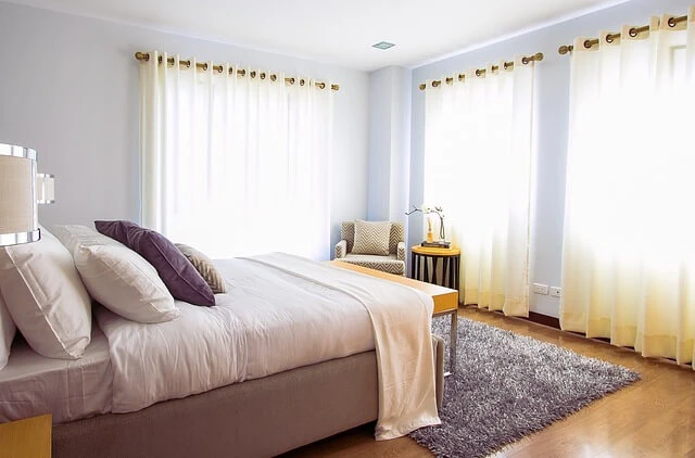 Interior Decorating-bedroom with coordinated sheers, bed and bedspread, pillows