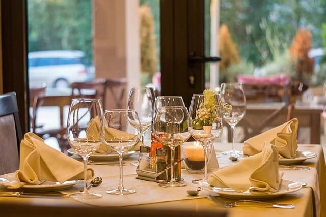 Restaurant-table elegantly set for four